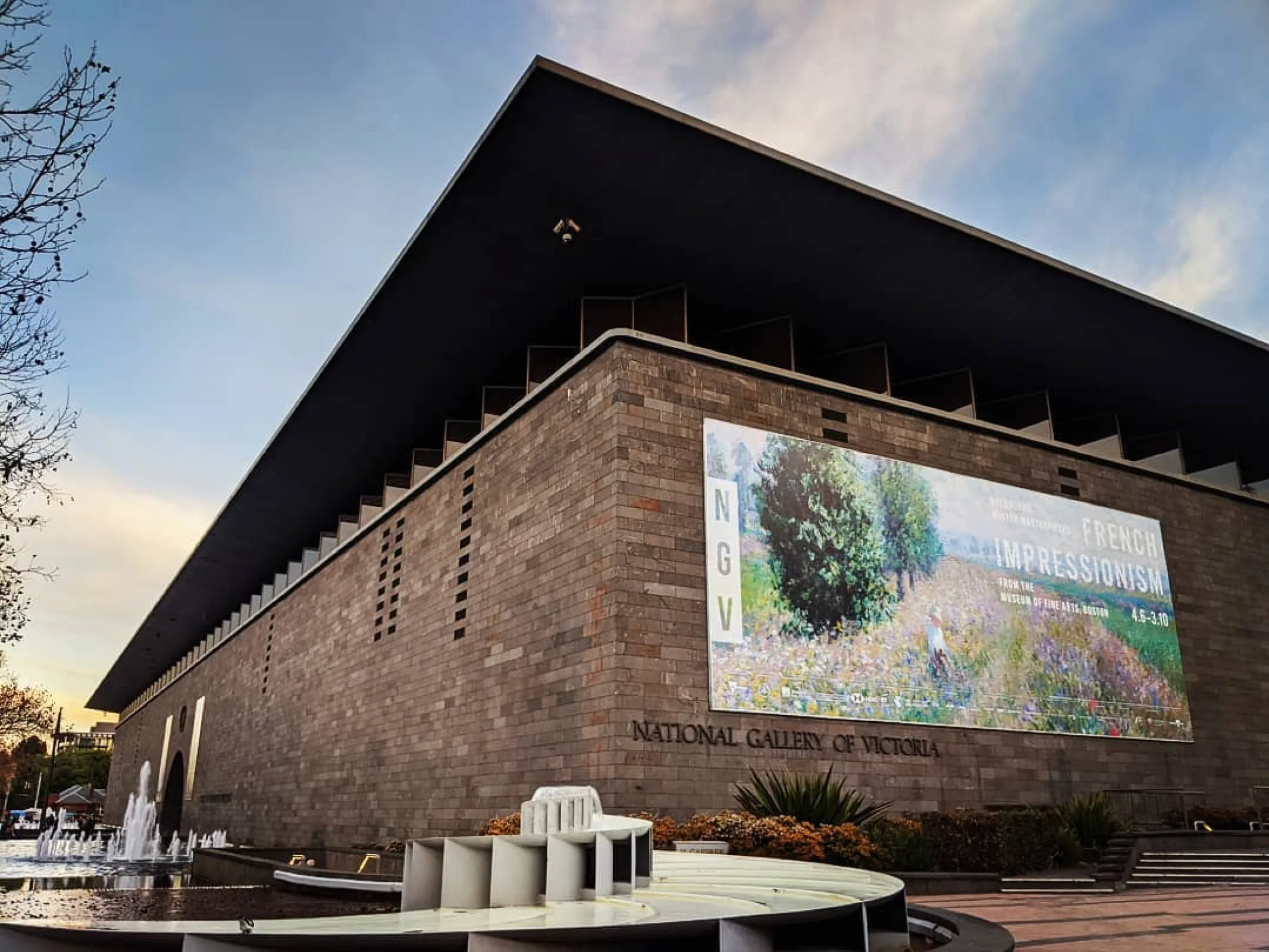 Visitors viewing French Impressionism paintings at NGV 2025 exhibition