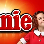 Cast of Annie 2025 performing live on stage at Melbourne’s Regent Theatre