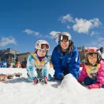 A young child enjoying snow sports near Melbourne during winter