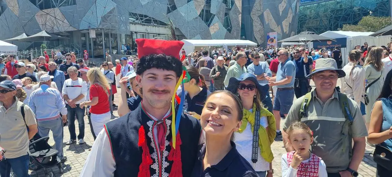 Crowds enjoying live music, dance, and Polish food at the Polish Festival @ Fed Square 2025 in Melbourne.