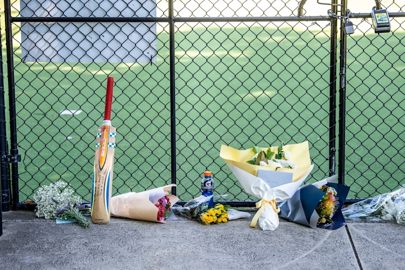 Tributes at Wally Tew Reserve for Ben Austin, the young Ferntree Gully cricketer remembered for his passion and joyful spirit.